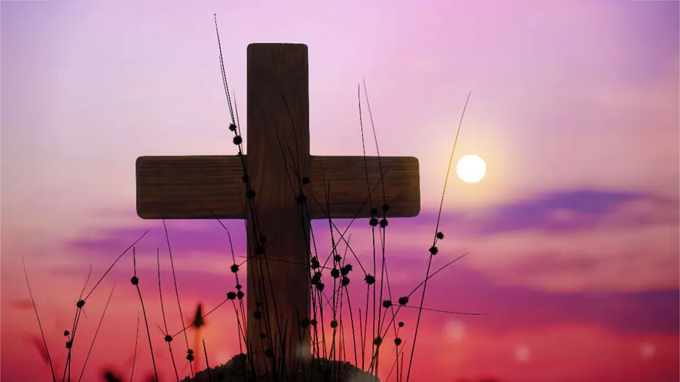 Cross with sunset in the background