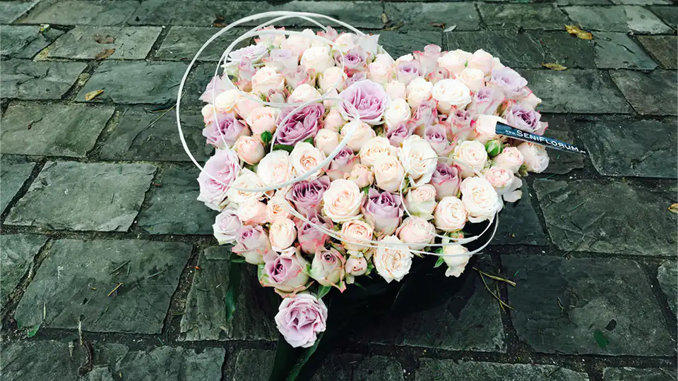 Heart shaped roses funeral arrangement