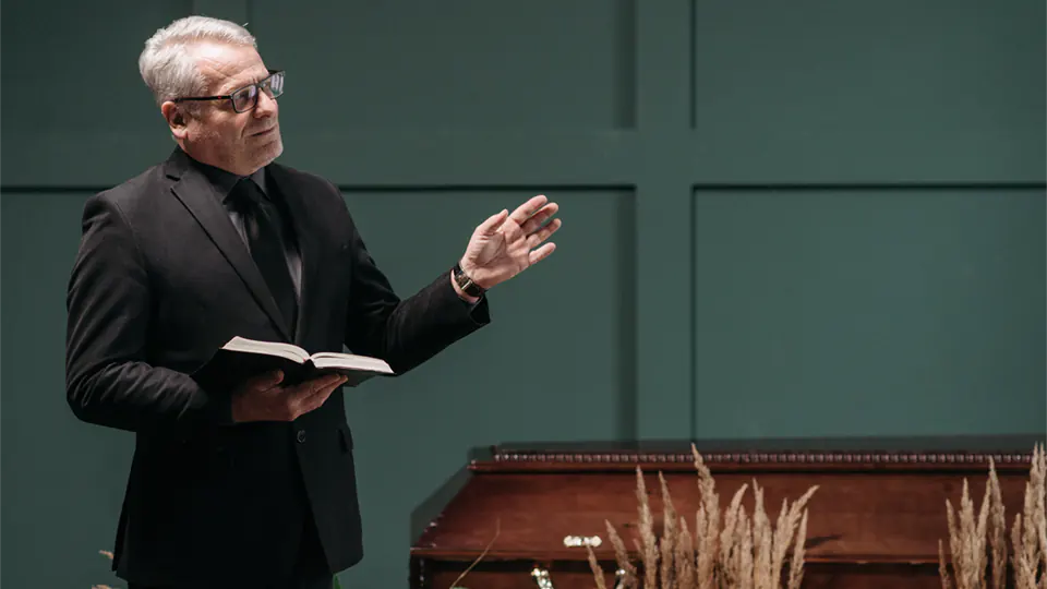 Spokesperson at a funeral