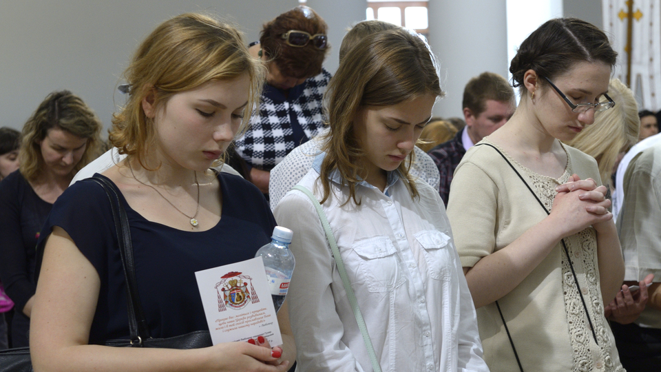 People in church praying