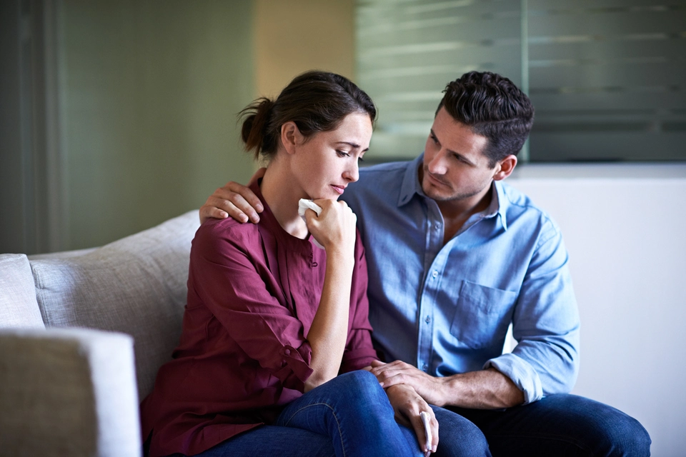 Anxious man and woman